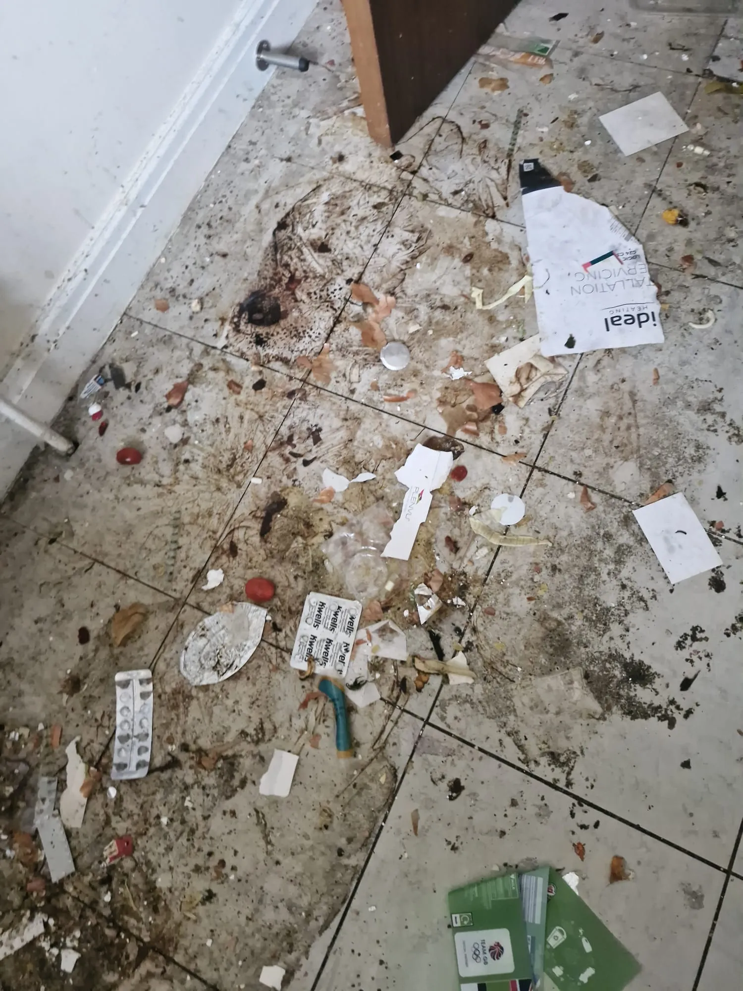 Before pre-refurbishment cleaning: heavily soiled tiled floor in Colchester, Essex