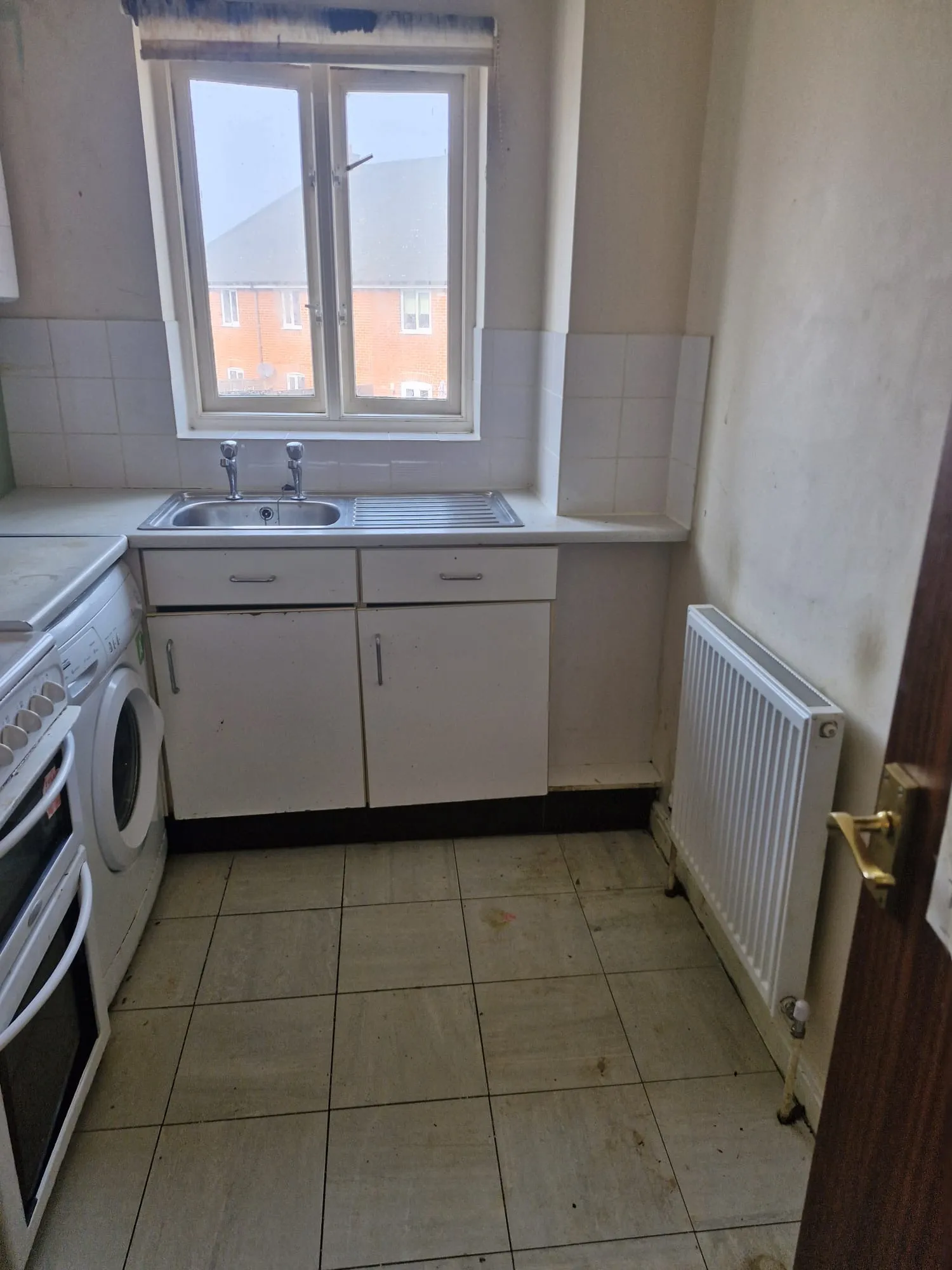 After specialist cleaning preparation: accessible kitchen sink and floor in Colchester