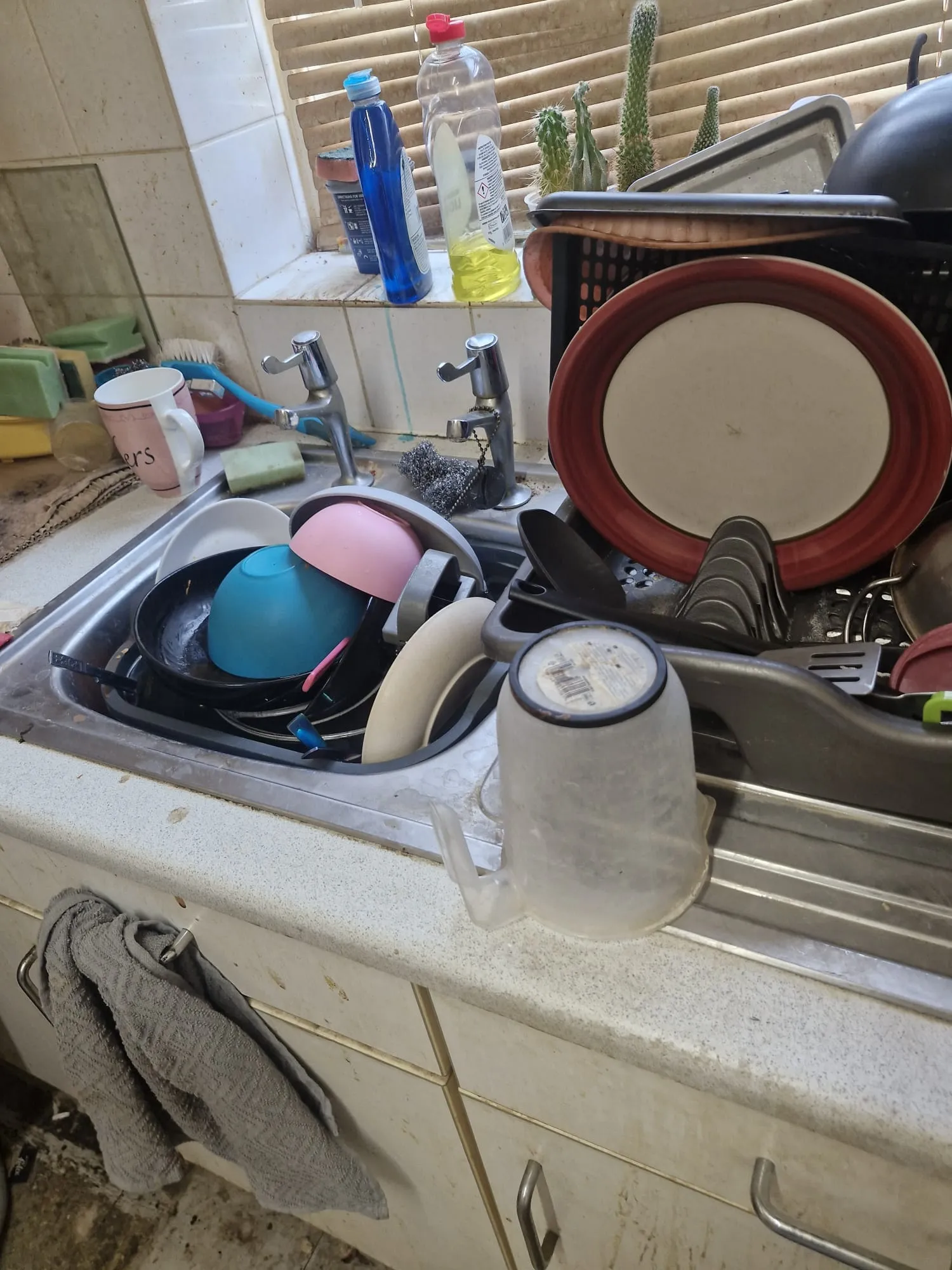 Before staged specialist cleaning: occupied kitchen with belongings in Colchester, Essex
